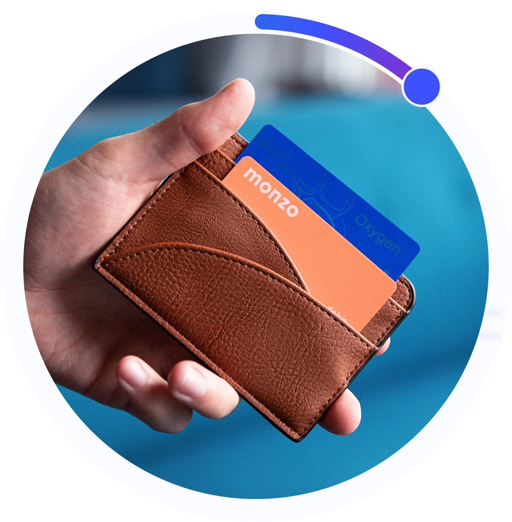hand holding leather-like wallet